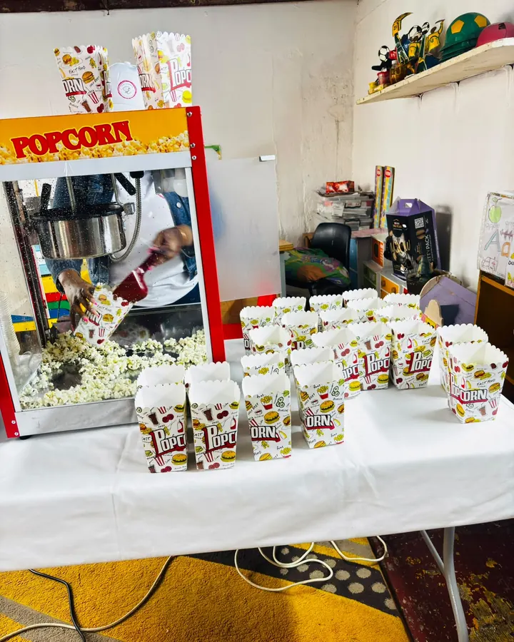 The popcorn machine mid-service with rows of filled boxes